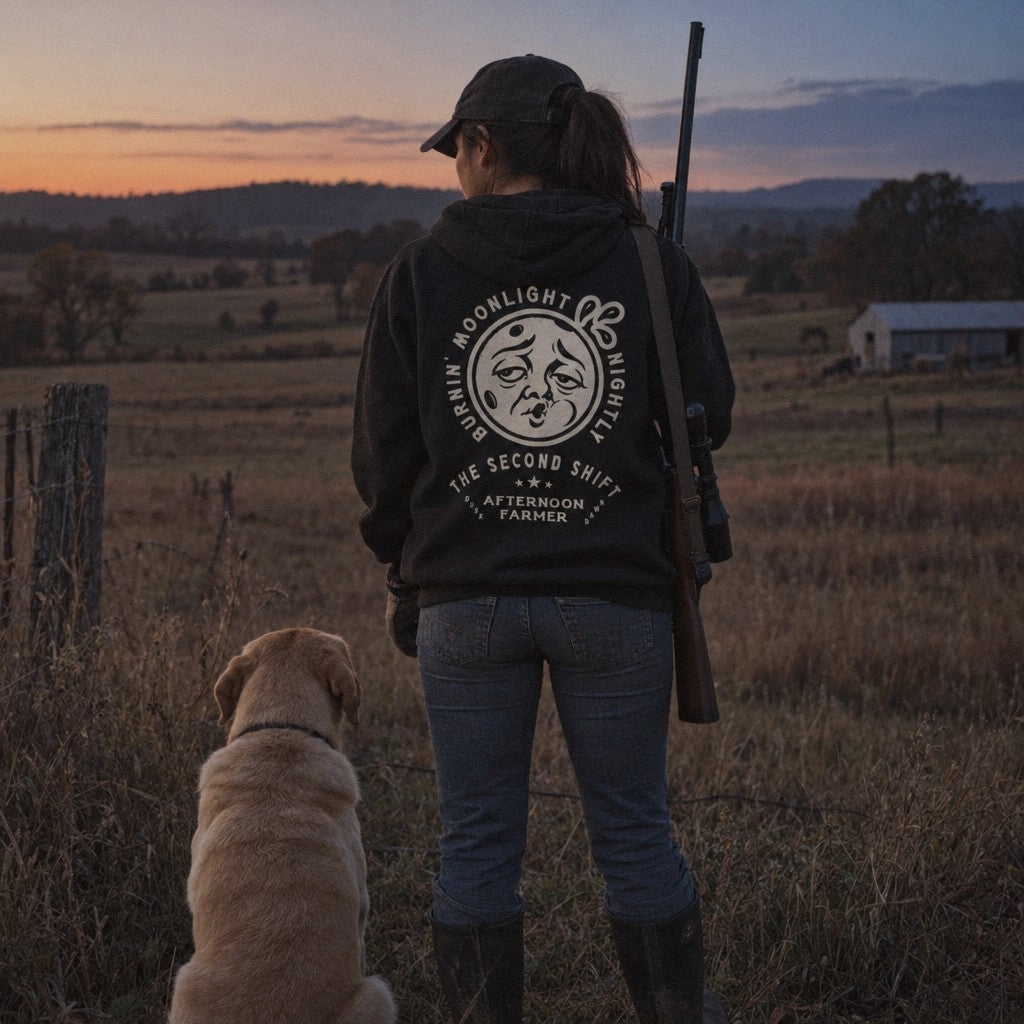 Burnin’ Moonlight Hoodie in Black, watching the field at dusk