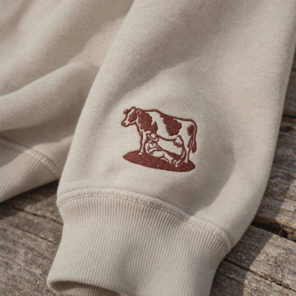 Cattywampus Crewneck in Bone, close-up wrist