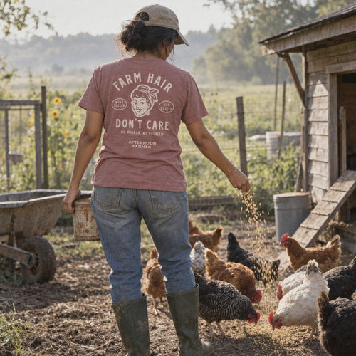 Farm Hair, Don’t Care Tee in Heather Mauve, feeding chickens