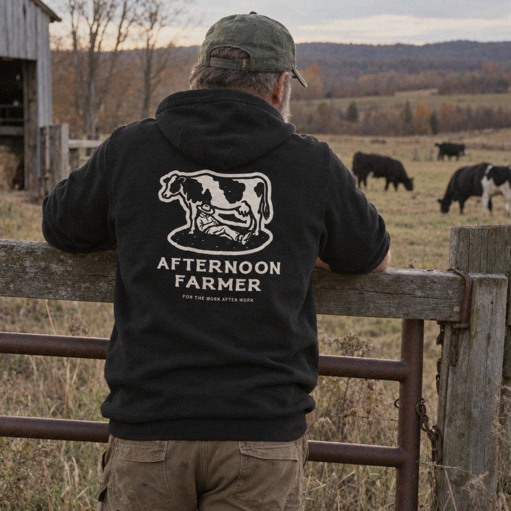Afternoon Farmer Logo Hoodie in Black, fence lean