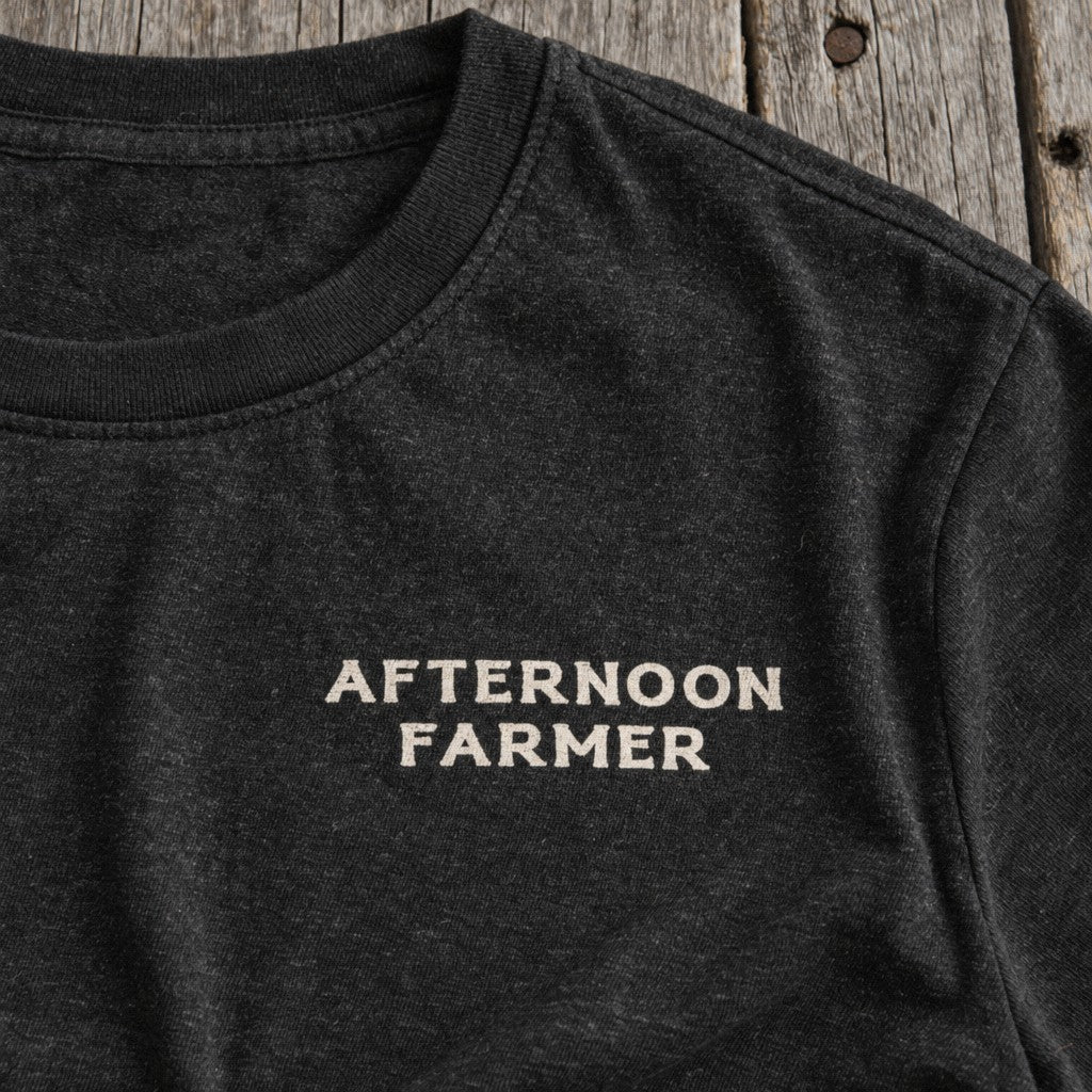 Afternoon Farmer Logo Tee in Black Heather, close-up front