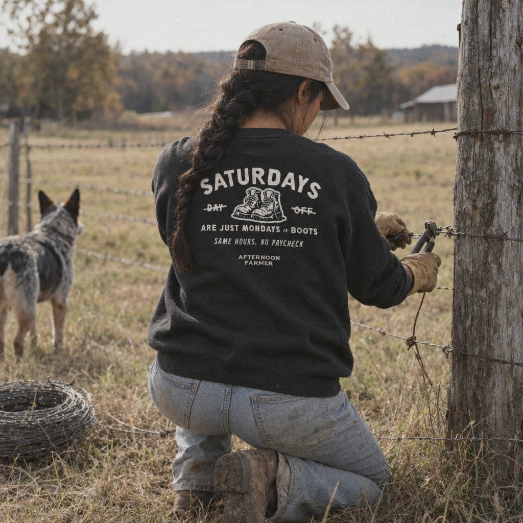 Saturday’s Just Monday in Boots Crewneck in Black, fixing fence