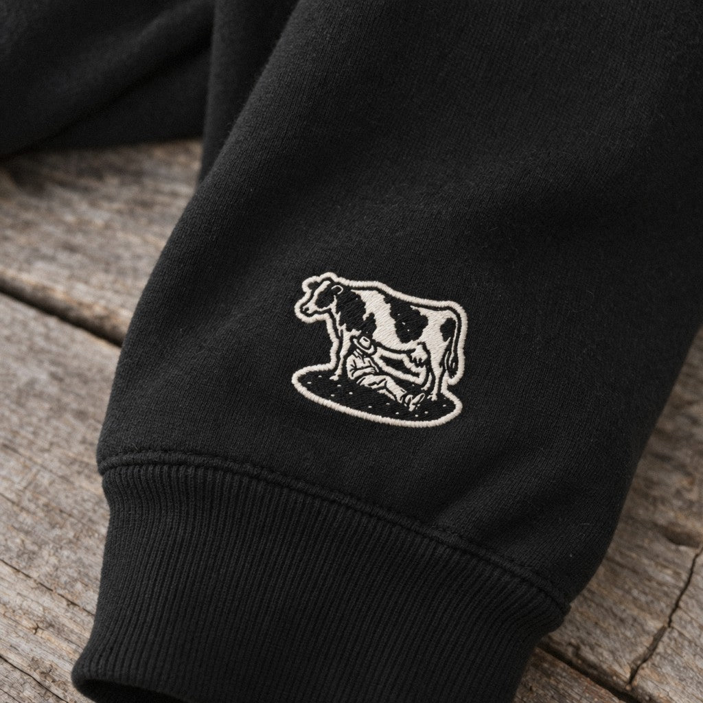 Spent My PTO on My PTO Crewneck in Black, close-up wrist